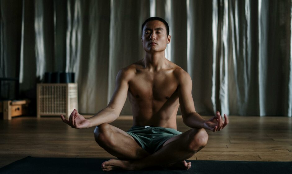 A man Performing Mindfulness Meditation